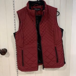 Andrew Marc quilted vest; sweater sides; good pockets.